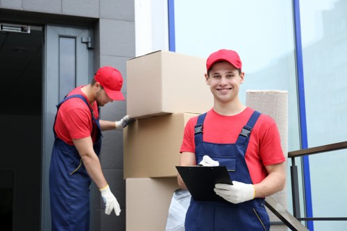 Loading furniture into a removal truck for an Ealing move