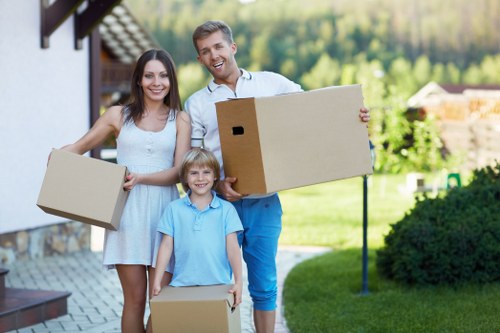 Careful lifting of furniture in a West London property