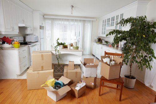 Furniture and moving supplies prepared for an Ealing apartment relocation
